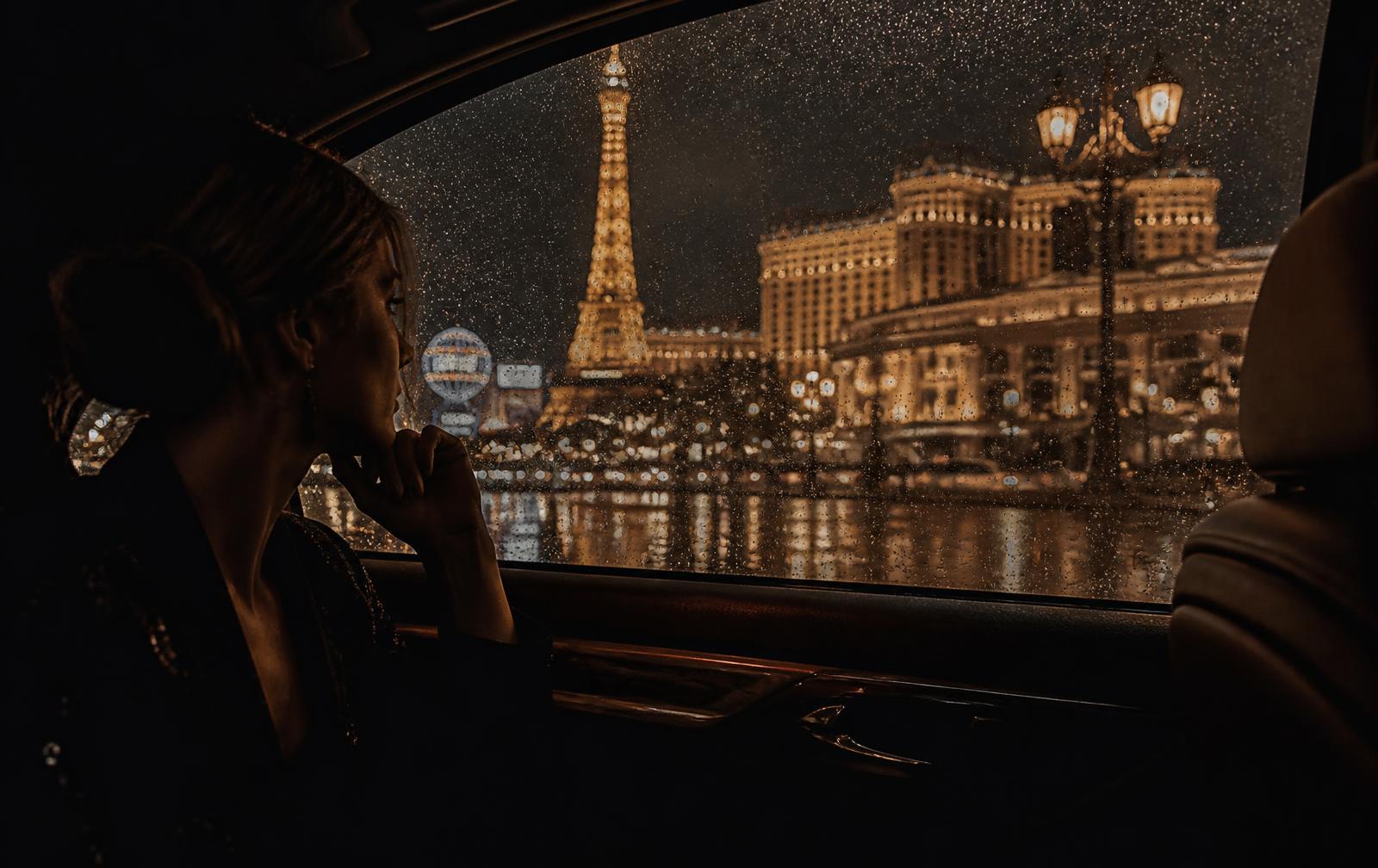 Las Vegas Strip lights seen from inside a luxury vehicle at night